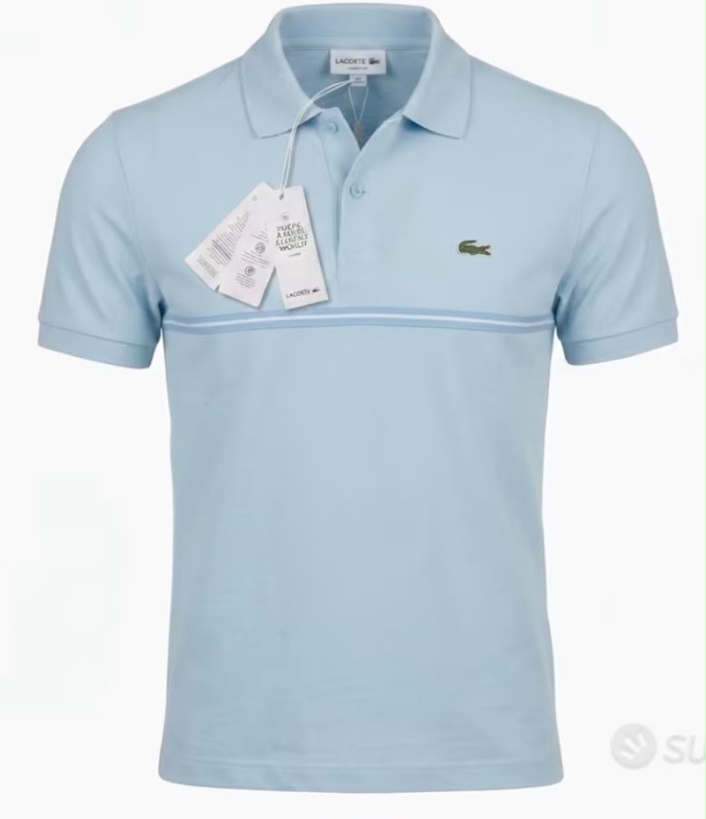 POLO LACOSTE LOGO LATO CUORE , SCRITTA SPALLE E RIGHINO CENTRALE