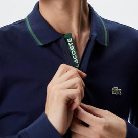 POLO LACOSTE UOMO COTONE , BORDO COLLO E MANICA VERDE E LOGO LATO CUORE CUCITO