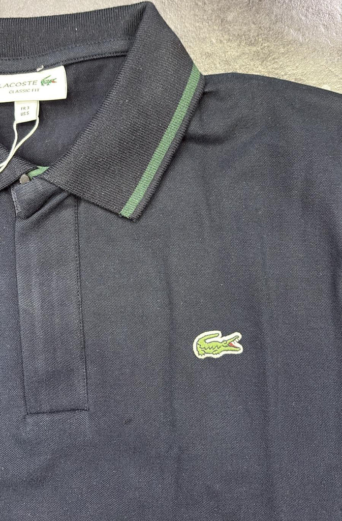 POLO LACOSTE UOMO COTONE , BORDO COLLO E MANICA VERDE E LOGO LATO CUORE CUCITO