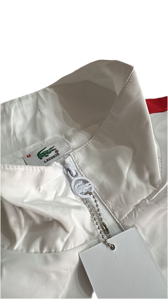 TUTA COMPLETA LACOSTE UNISEX MICROFIBRA CON BANDE LATERALI COLORATE E LOGO GRANDE RETRO