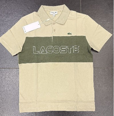 POLO LACOSTE BICOLOR CON SCRITTA CENTRALE