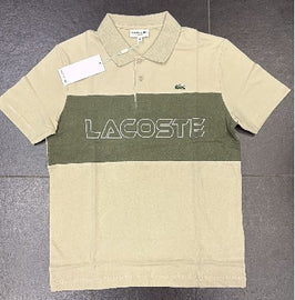 POLO LACOSTE BICOLOR CON SCRITTA CENTRALE