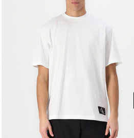 T-SHIRT CALVIN KLEIN CON TARGHETTA SUL FIANCO CUCITO