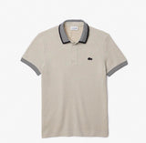 POLO LACOSTE CON STRISCE COLLETTO E LOGO LATO CUORE NERO