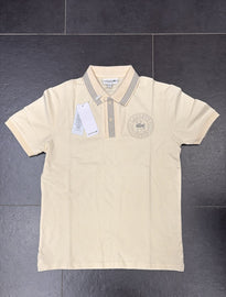POLO LACOSTE CON LOGO CERCHIATO CUCITO