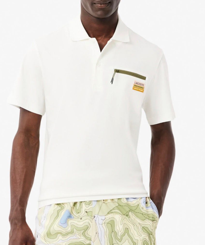 POLO LACOSTE CON CERNIERA LATO CUORE