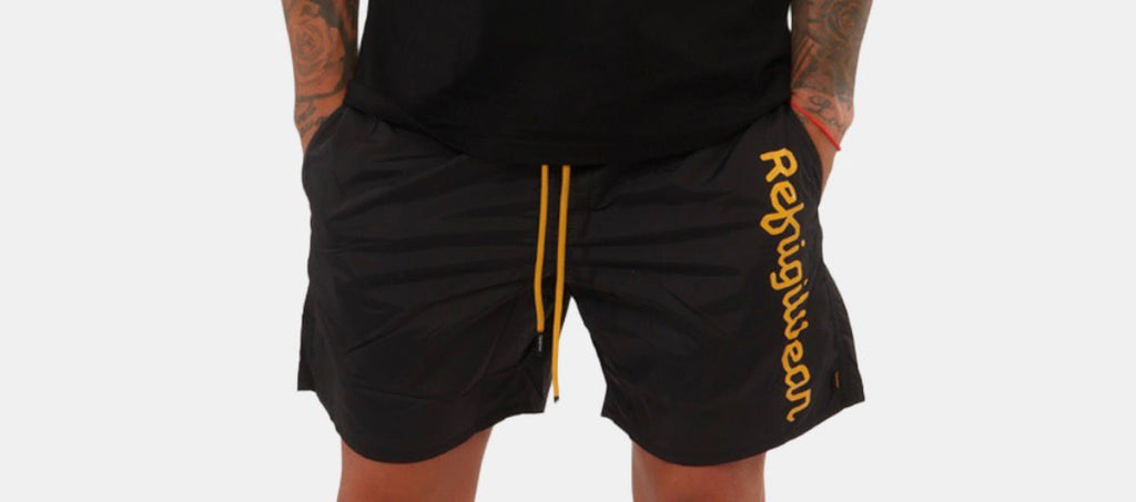 COSTUME REFRIGIWEAR CON SCRITTA VERTICALE GAMBA