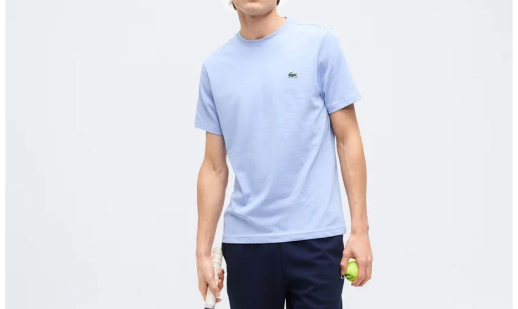 T-SHIRT LACOSTE CON LOGO LATO CUORE E PORTA E SCRITTA RETRO