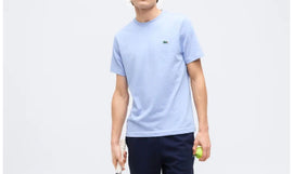 T-SHIRT LACOSTE CON LOGO LATO CUORE E PORTA E SCRITTA RETRO