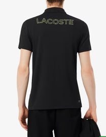 POLO LACOSTE CON RIGHINO CENTRALE E SCRITTA RETRO ORO
