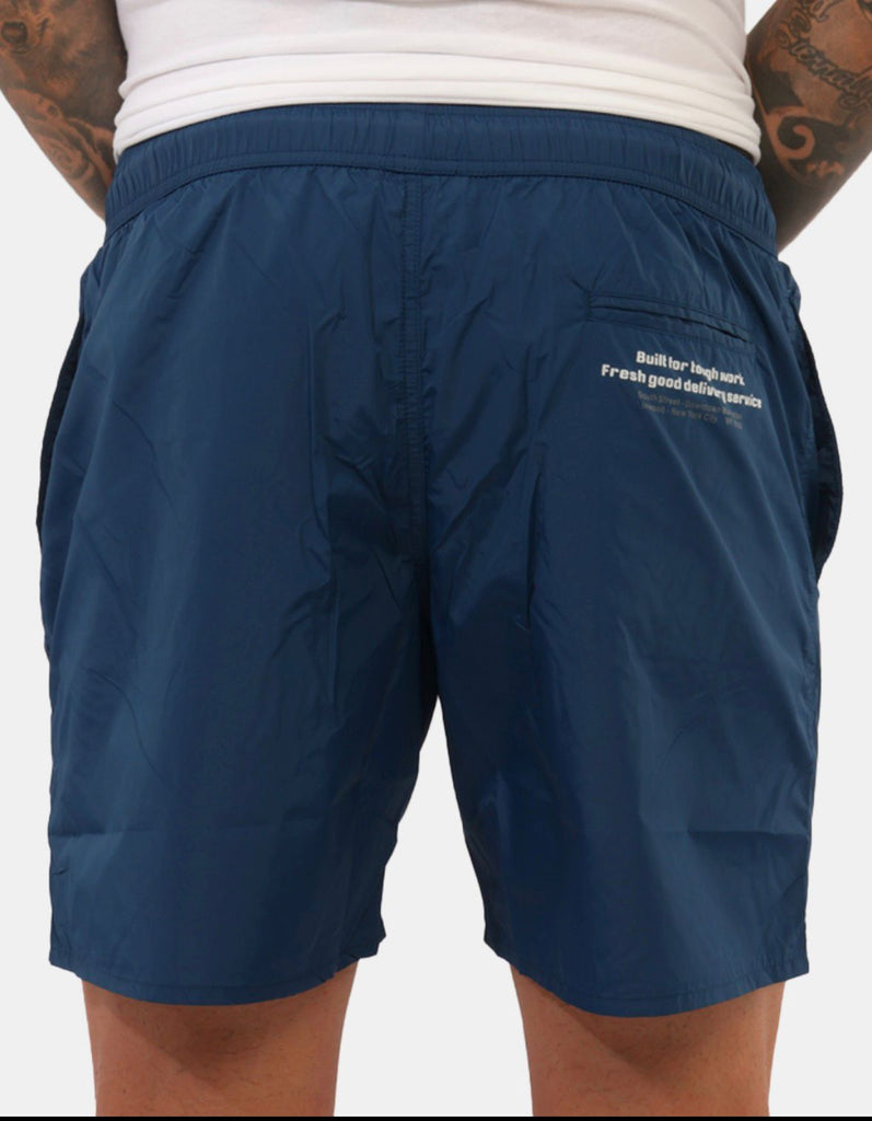 COSTUME REFRIGIWEAR CON SCRITTA VERTICALE GAMBA