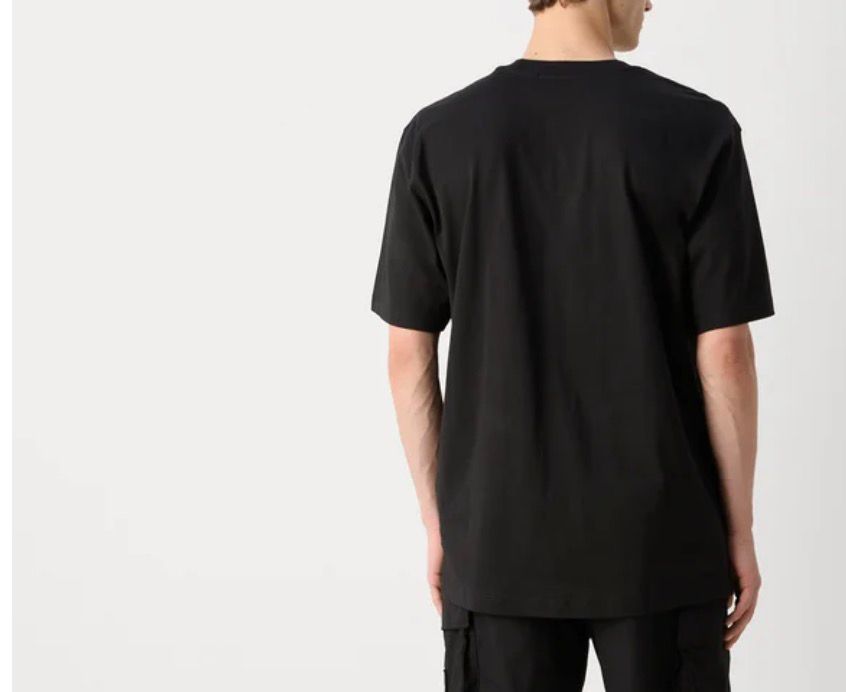 T-SHIRT CALVIN KLEIN CON TARGHETTA SUL FIANCO CUCITO